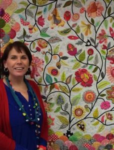 Deborah Louie with her Secret Garden Quilt